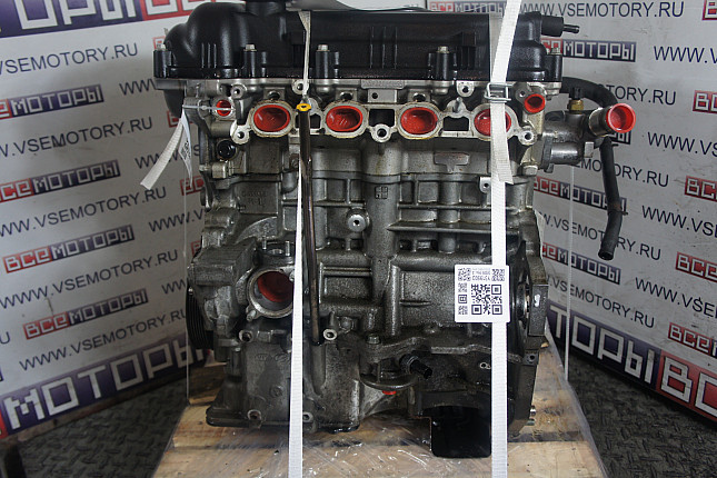 Двигатель вид с боку KIA G4FC