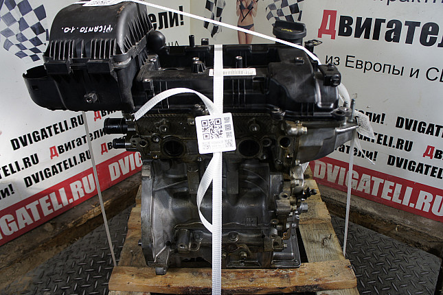 Двигатель вид с боку KIA G3LA