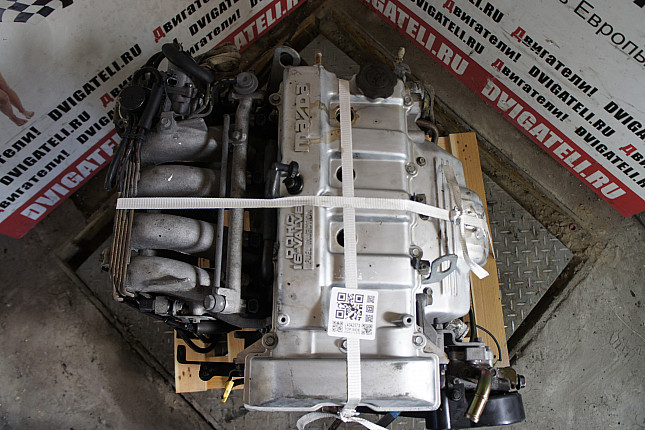 Фотография контрактного двигателя сверху Mazda FS 
