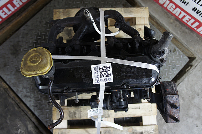 Фотография контрактного двигателя сверху Ford J4B