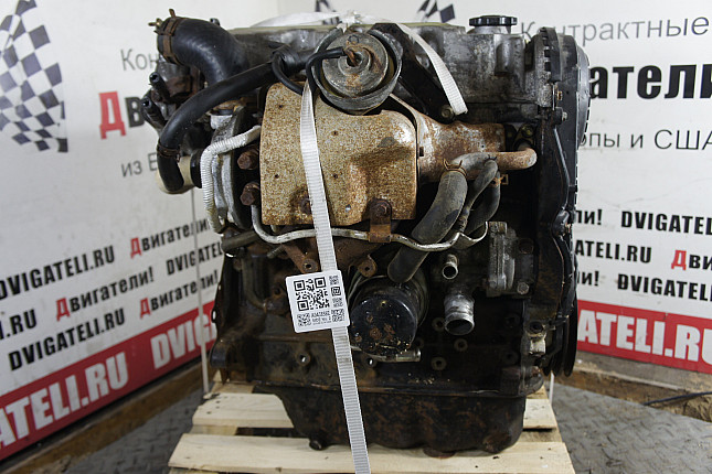 Двигатель вид с боку Mazda RF2A